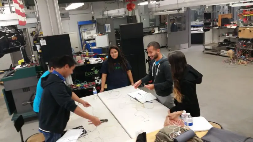 The Cal State L.A. electrical team getting hands on practice that will allow them to work on their own and excel in their classes.