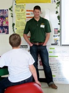Levi Weber answers a question during one of the presentations at Blevins Middle School.